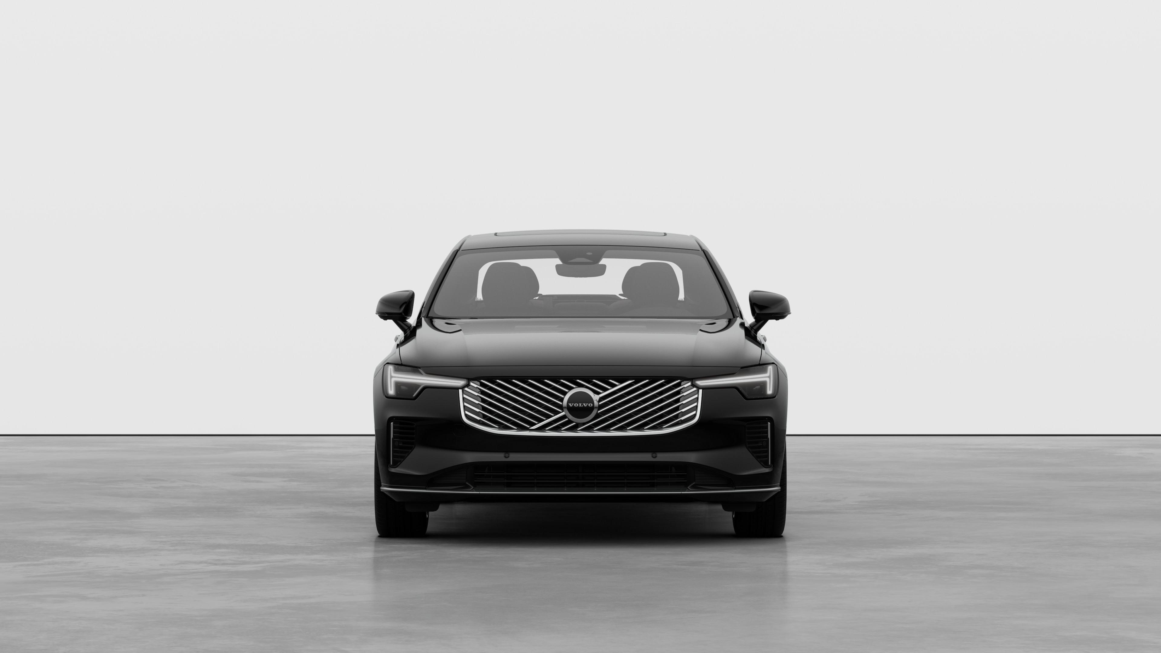 沃尔沃汽车在普通工作室背景中的前视图。