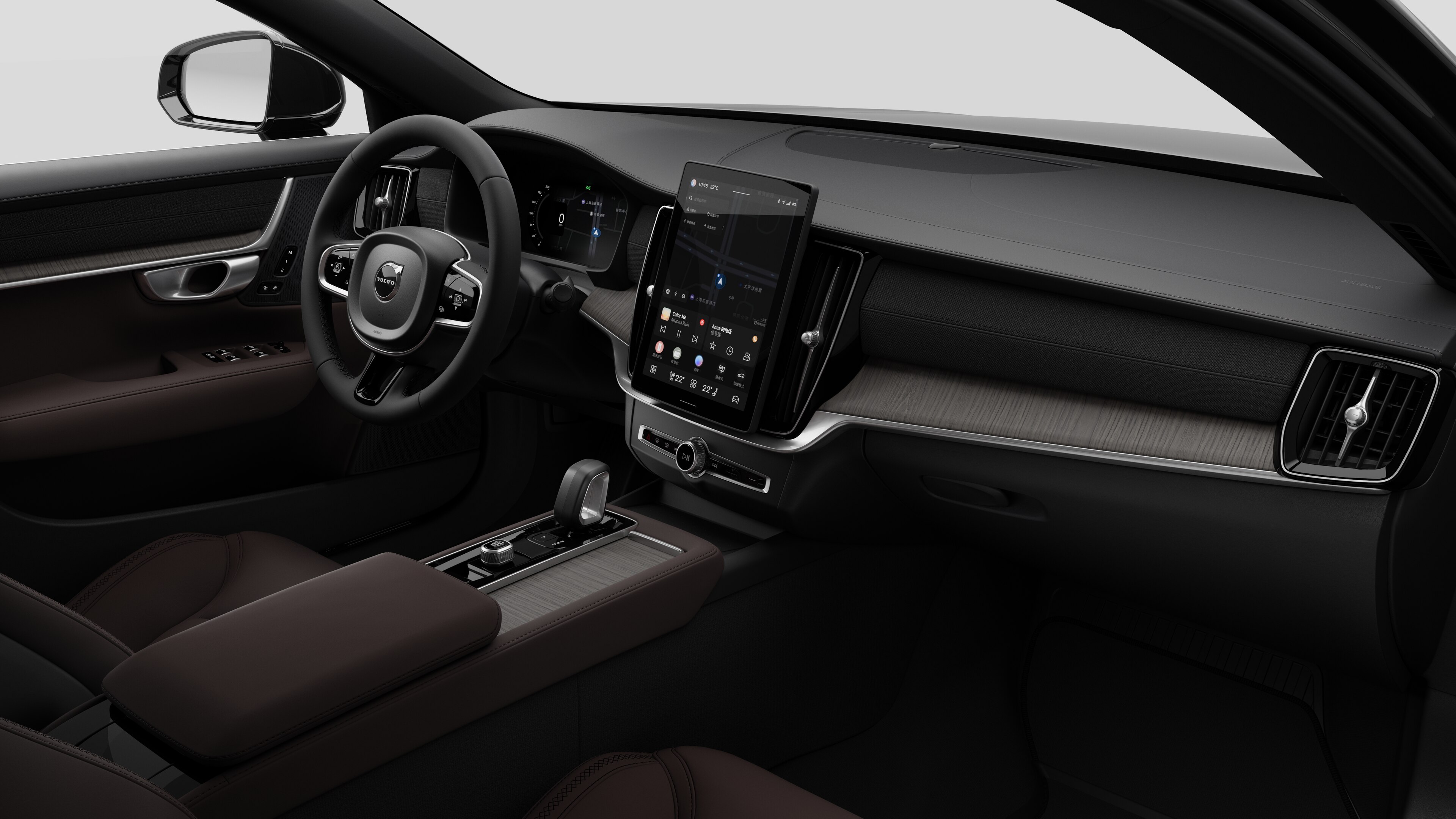 沃尔沃汽车的内部视图，在纯工作室背景中显示仪表板、方向盘、中控台和数字显示屏。