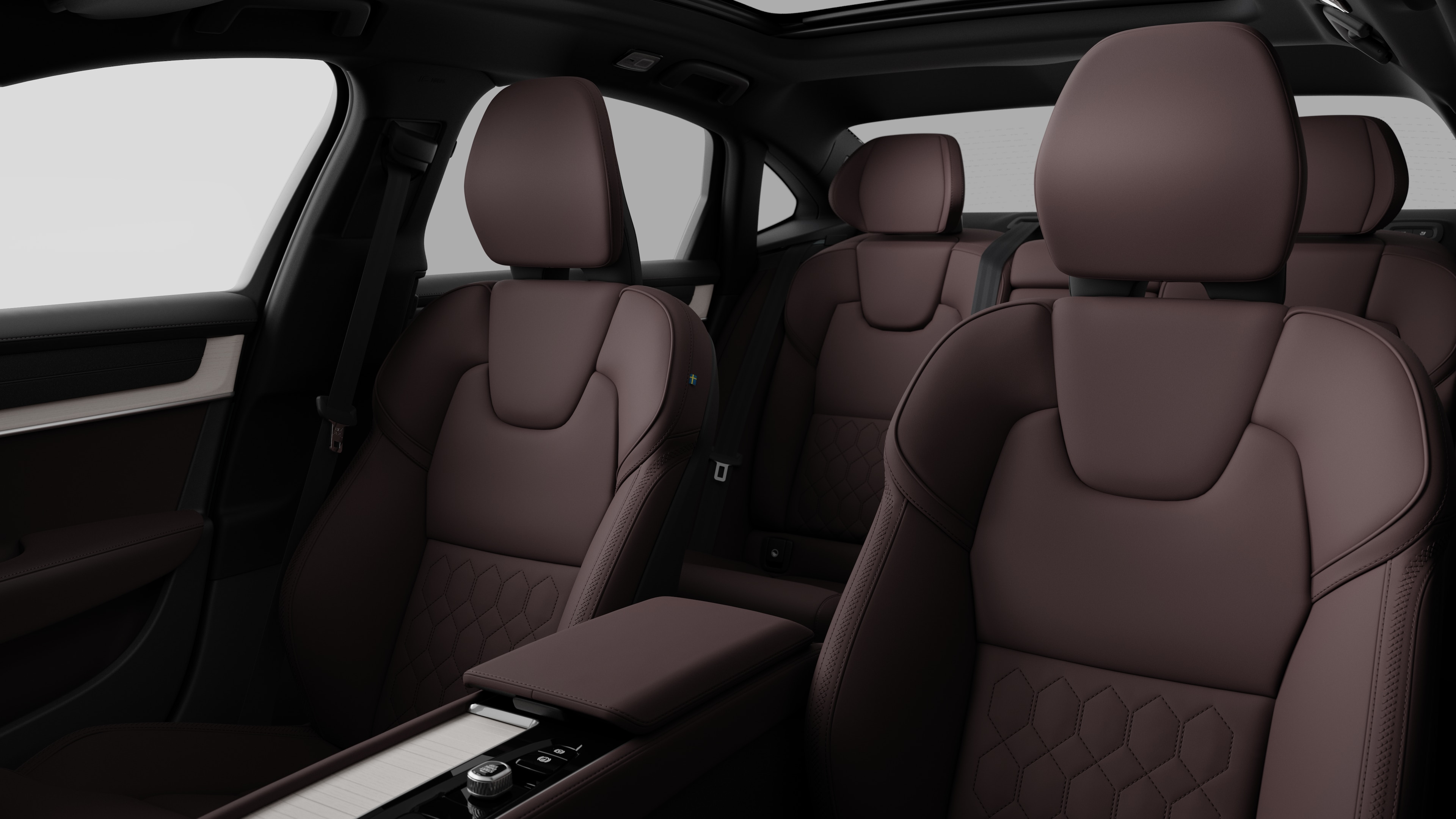 沃尔沃汽车内饰在纯工作室背景中显示后排乘客座椅和中控台。