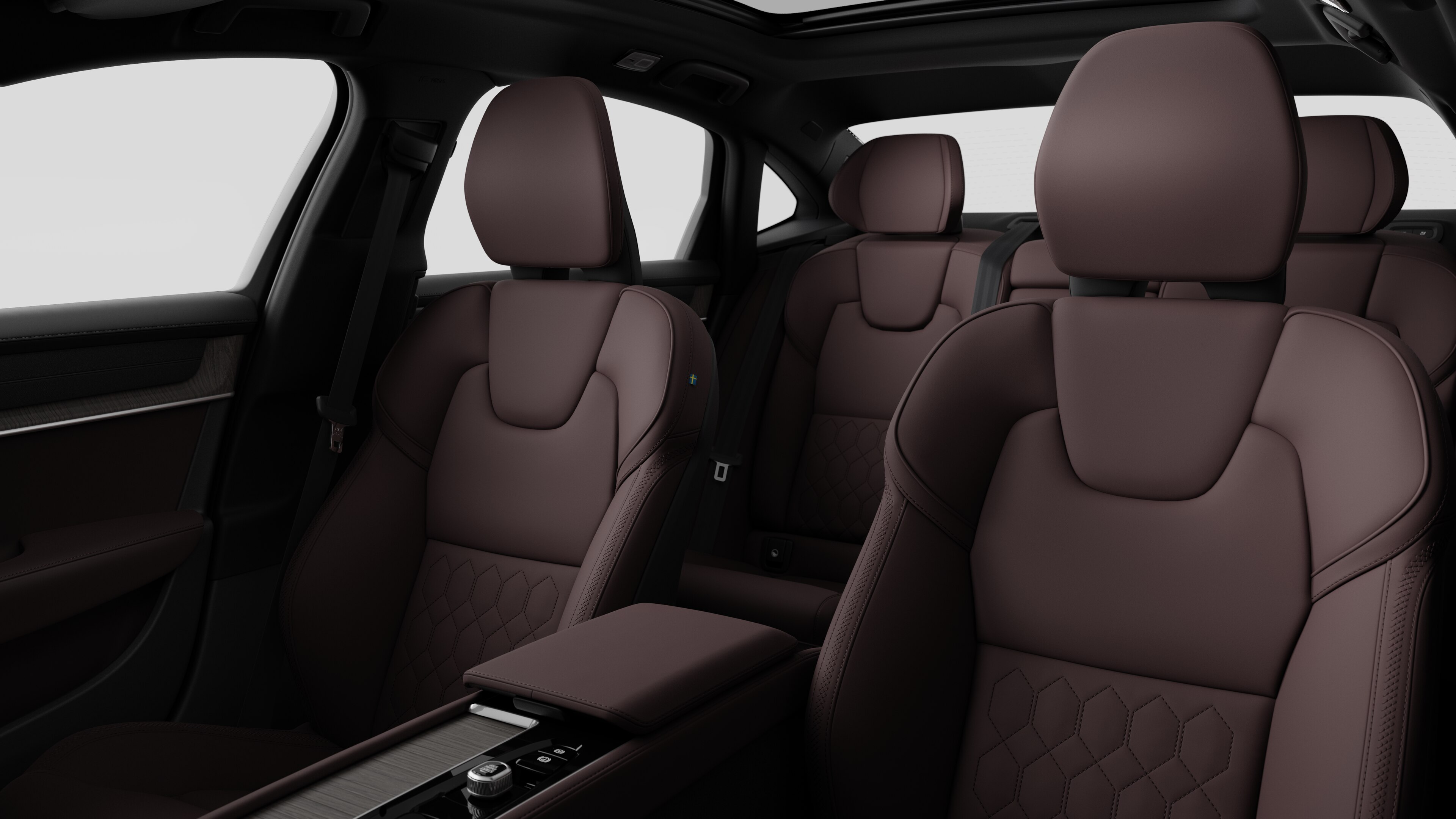 沃尔沃汽车内饰在纯工作室背景中显示后排乘客座椅和中控台。