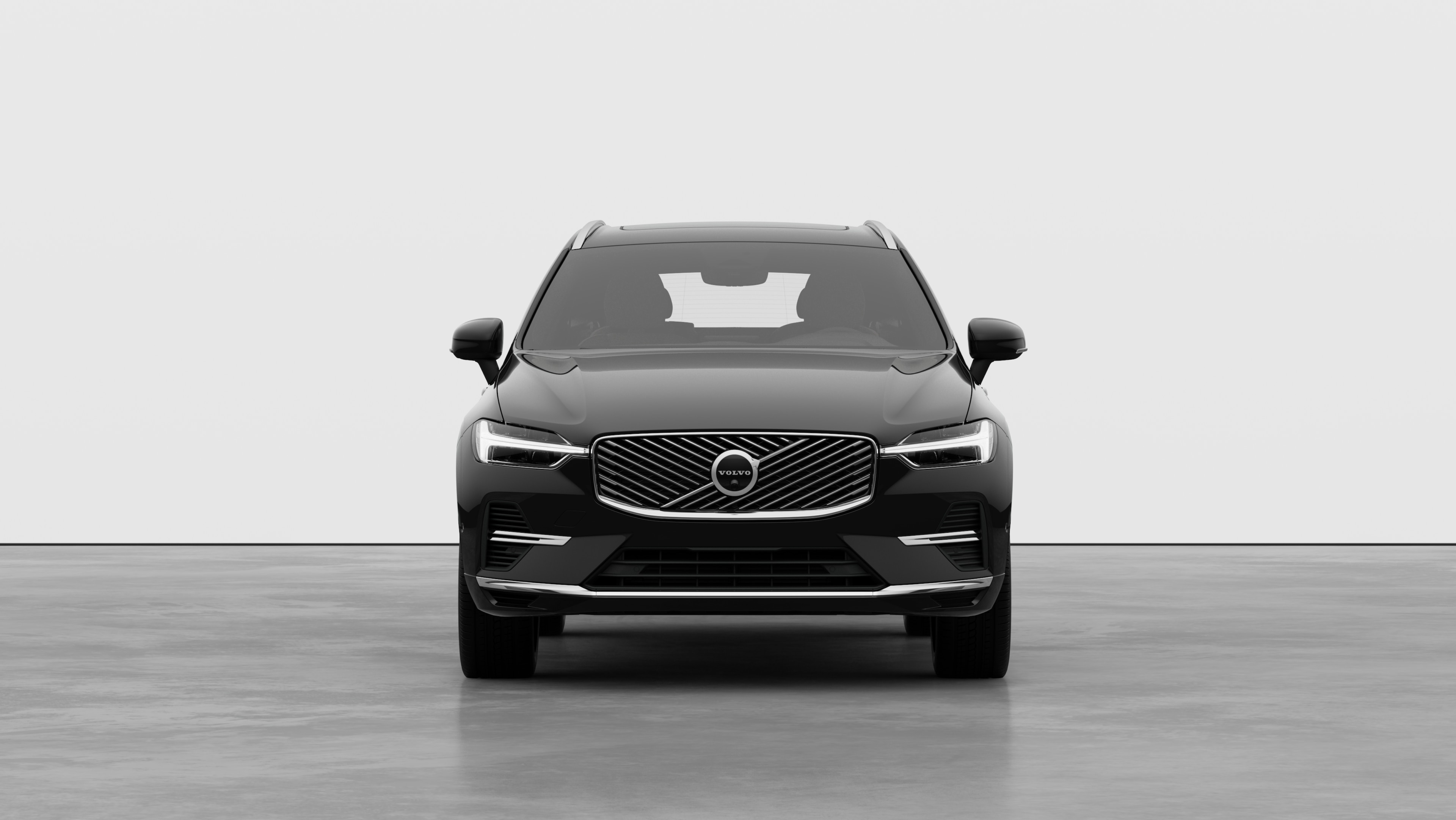 沃尔沃汽车在普通工作室背景中的前视图。