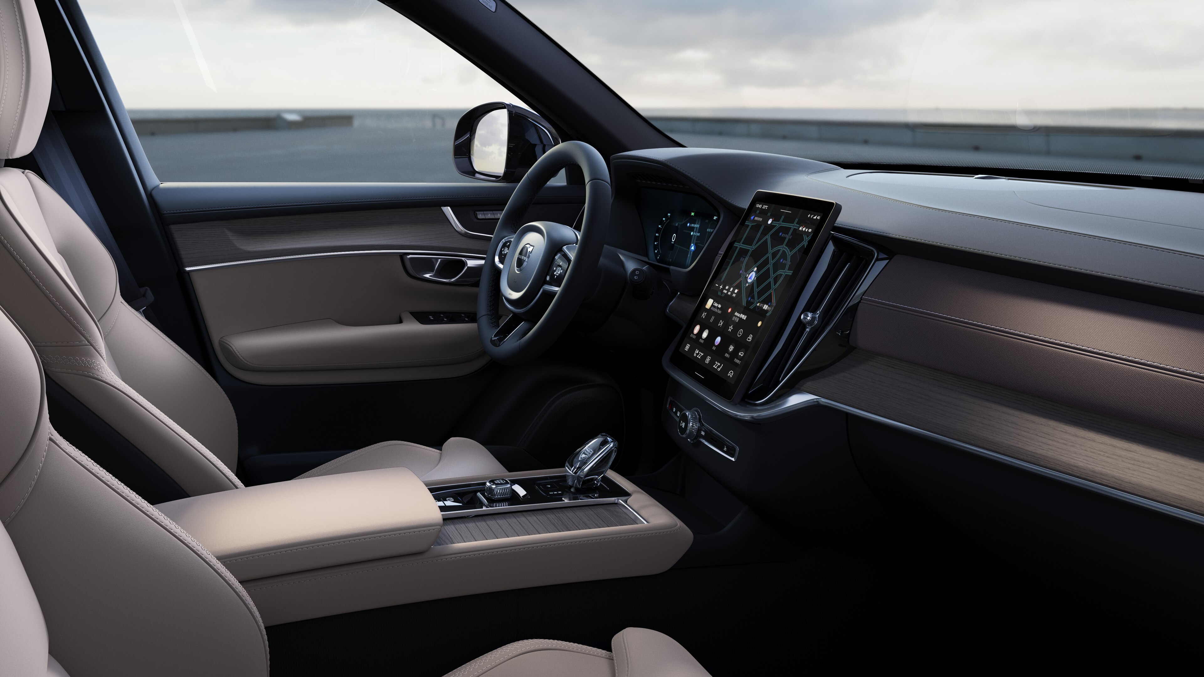 沃尔沃汽车内饰显示仪表板、方向盘和中控台，并在开阔的道路背景下显示数字显示屏。