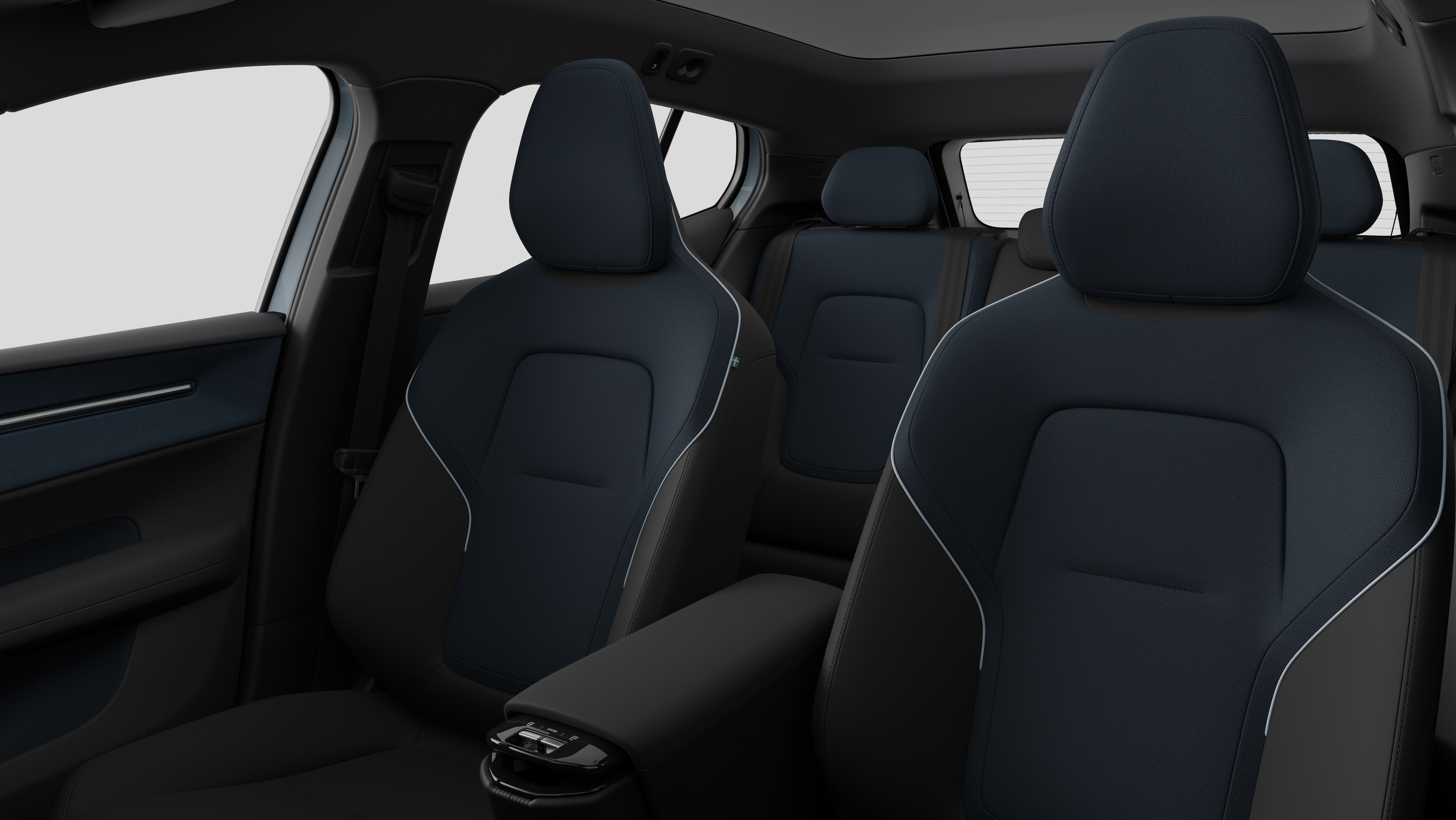 沃尔沃汽车内饰在纯工作室背景中显示后排乘客座椅和中控台。