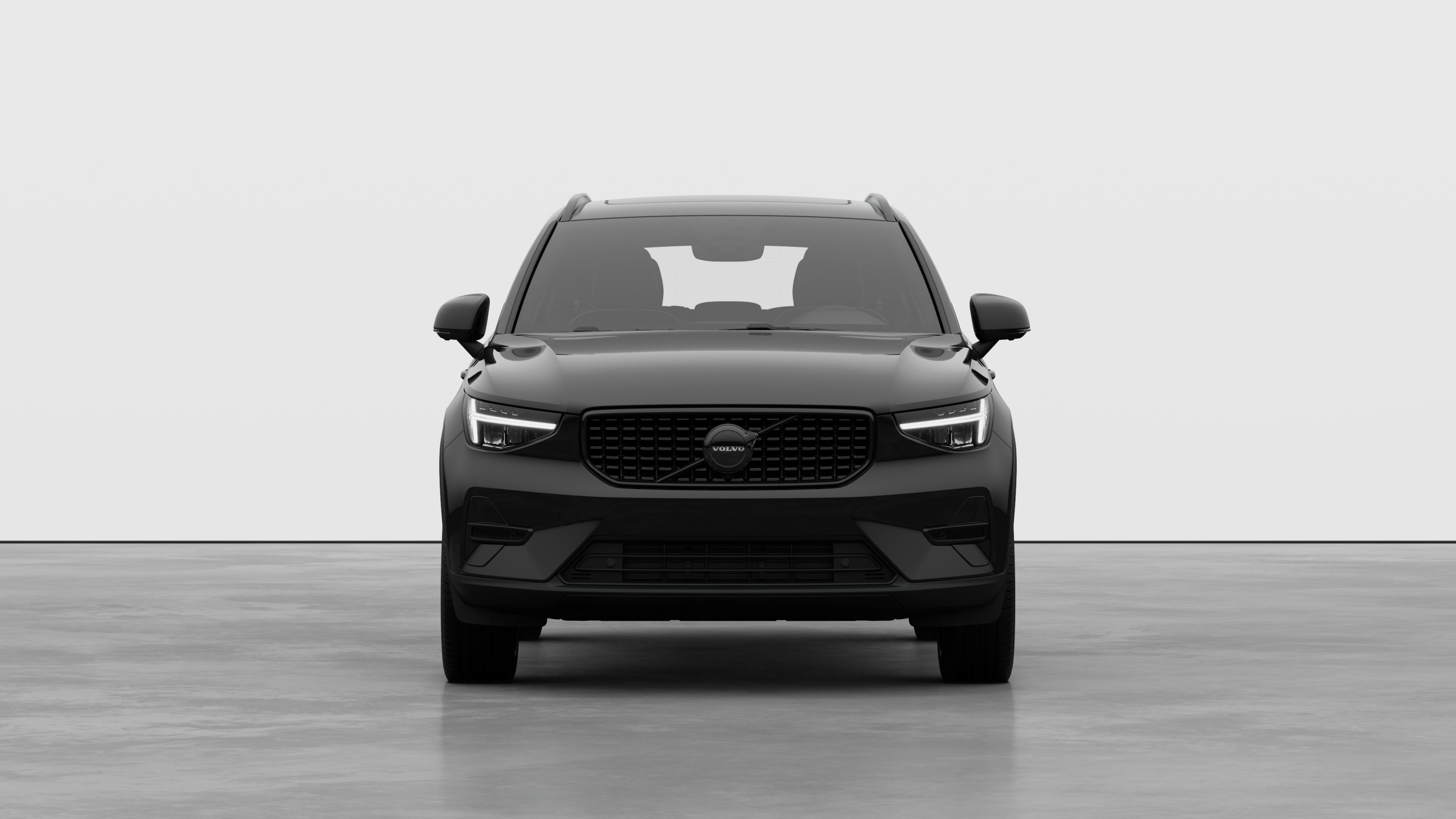 沃尔沃汽车在普通工作室背景中的前视图。