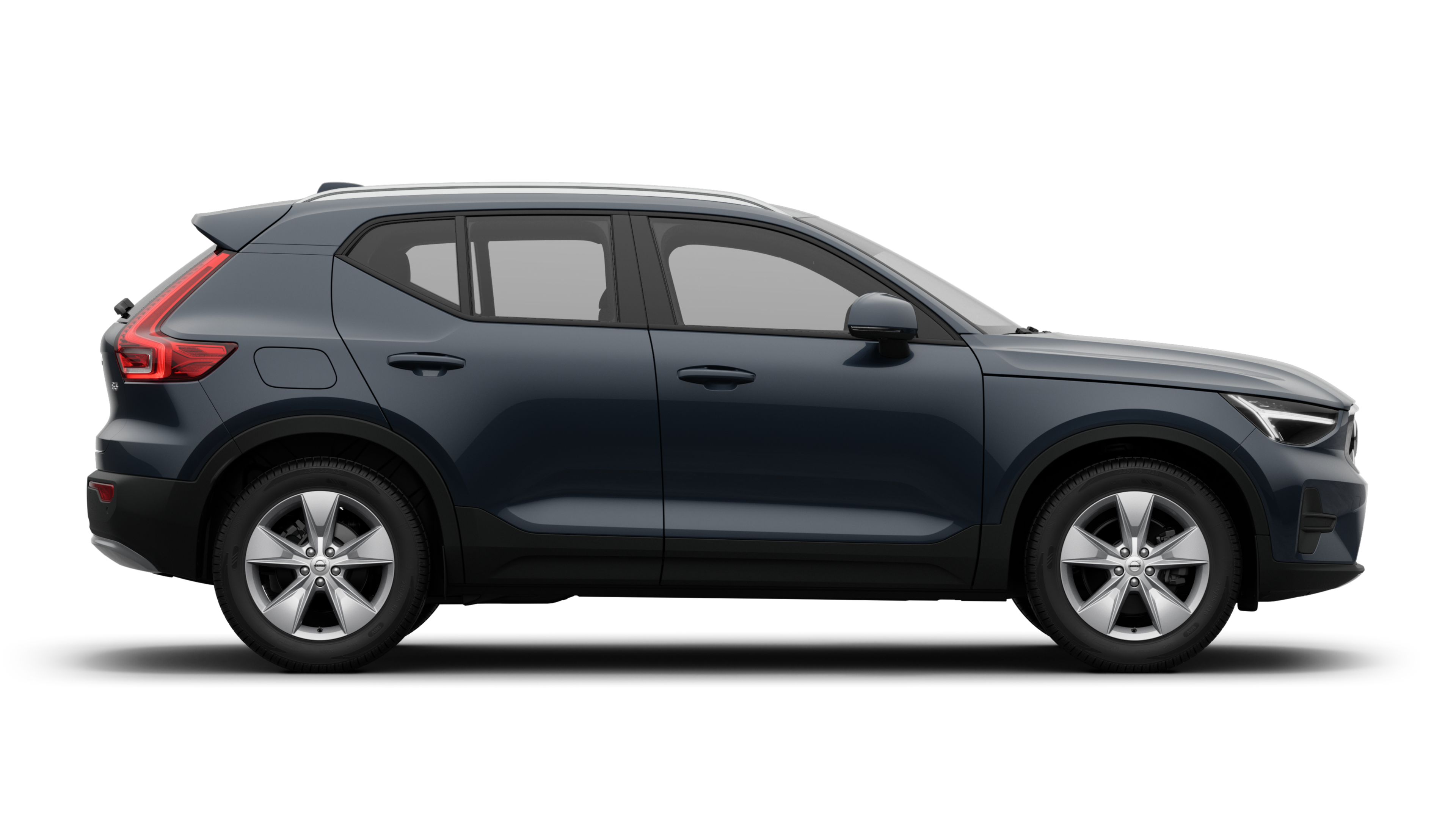 沃尔沃汽车侧视图在纯工作室背景上显示关闭的车门和可见的车轮设计。